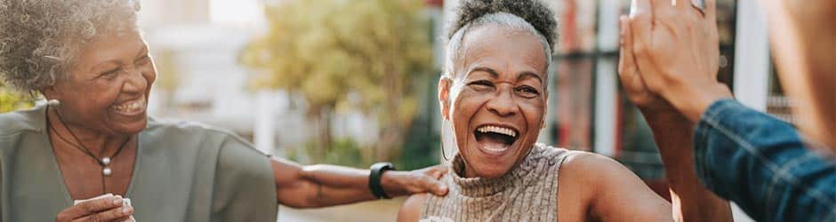 seniors enjoying a game of cards
