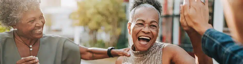 seniors enjoying a game of cards